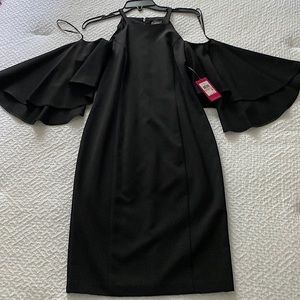 Beautiful true black dress, brand new with tags, size 2, very rich material!